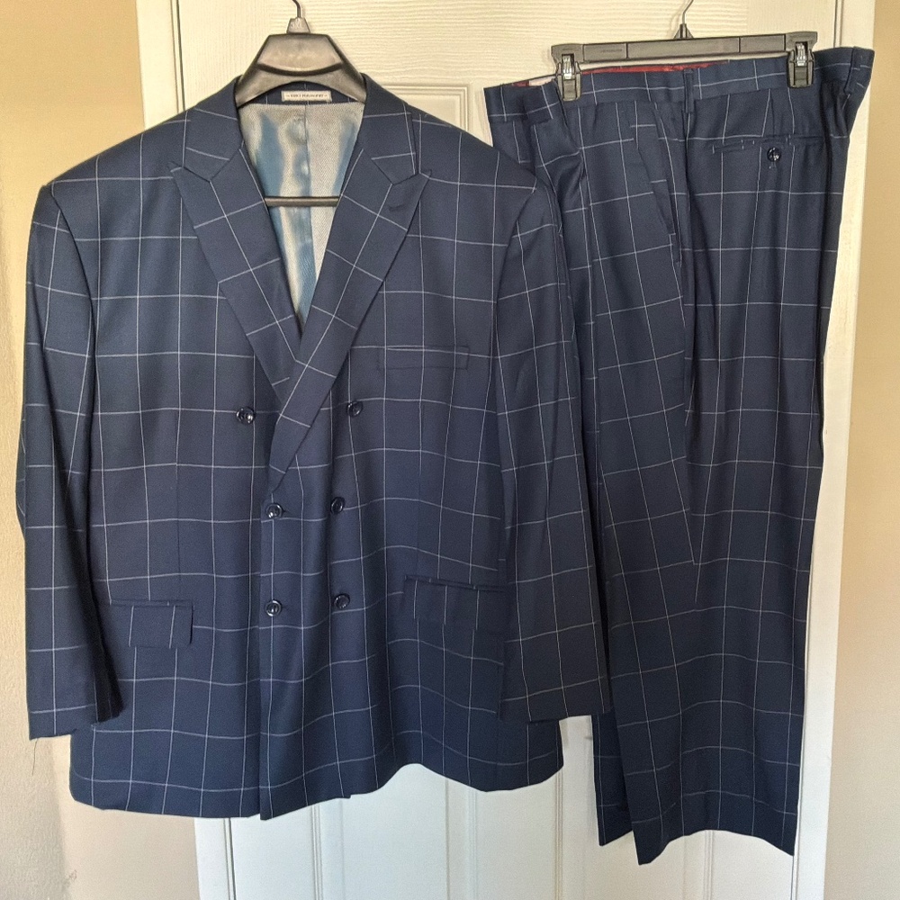 Men’s suit dark blue.   Jacket is a 52R. Pants 46R